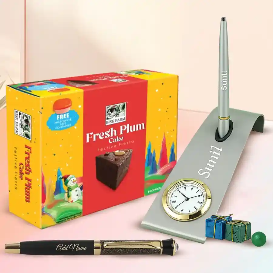 Gorgeous personalized desktop set featuring a plum cake, custom-engraved pen, elegant pen stand, and sleek clock.