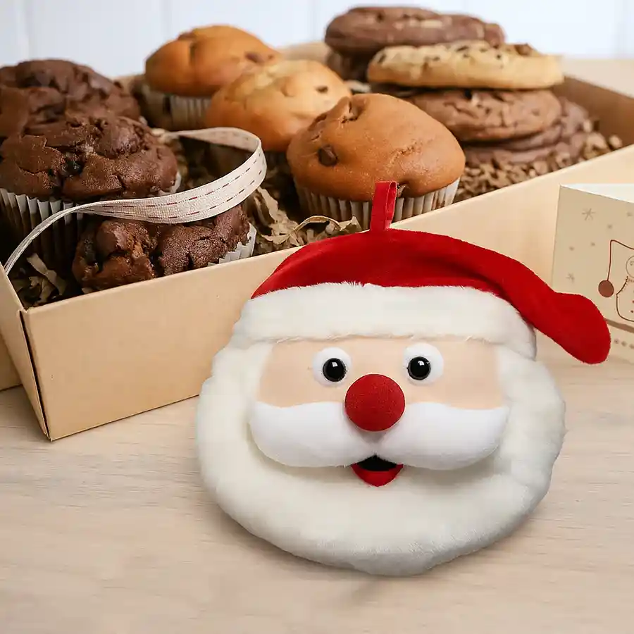 Mind Blowing Xmas Dessert Combo with Santa Cushion including cookies, muffins, and almond fingers in festive packaging