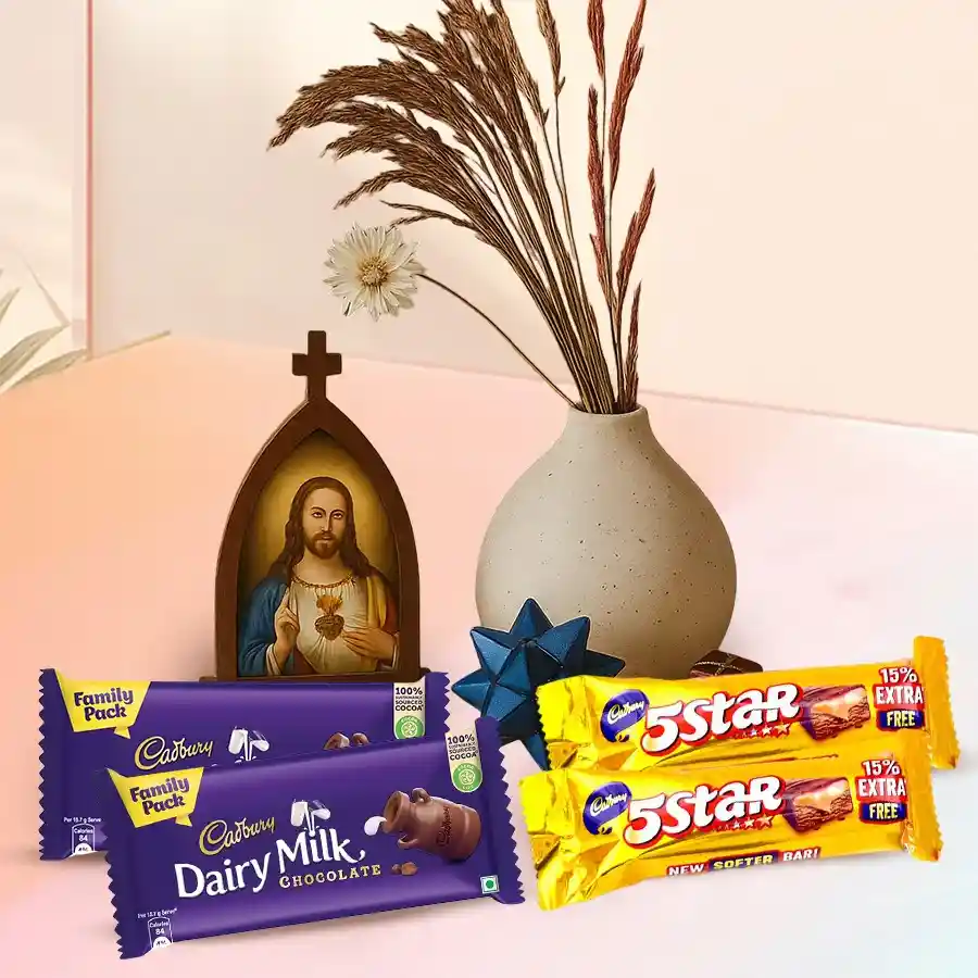 Holy Cross Statue Pendant alongside Cadbury Dairy Milk and 5 Star chocolate bars in an elegant gift set.