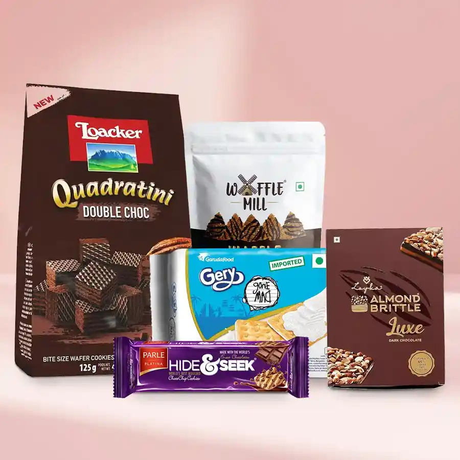 Christmas gift hamper filled with Scrumptous Waffers, Waffles, Cookies, and Crackers, including Double Choco Wafer Cookies, Choco-Chip Biscuits, Coconut Cream Crackers, Almond Brittle Pralines, and Waffle Chocolate Chips.