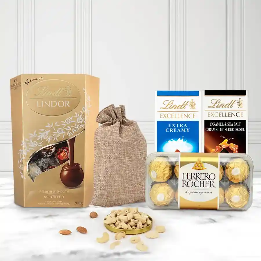 Gift hamper featuring imported chocolates and dried nuts for Christmas.