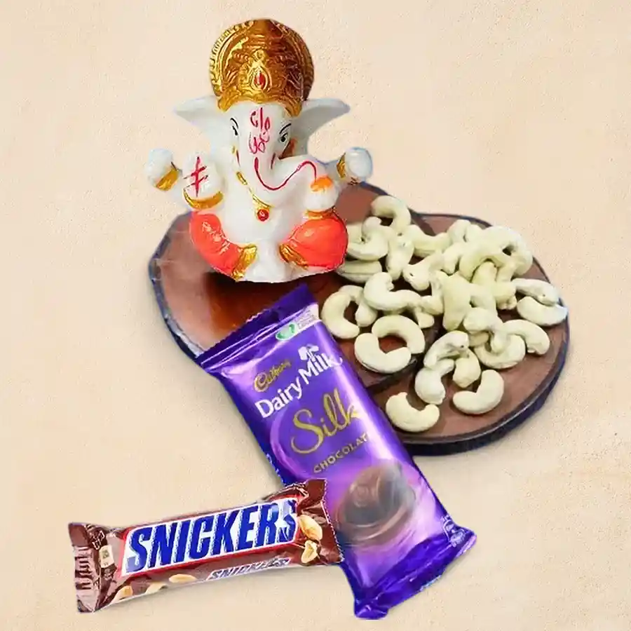 Jaipuri Marble Ganpati Idol surrounded by dry fruits and chocolates