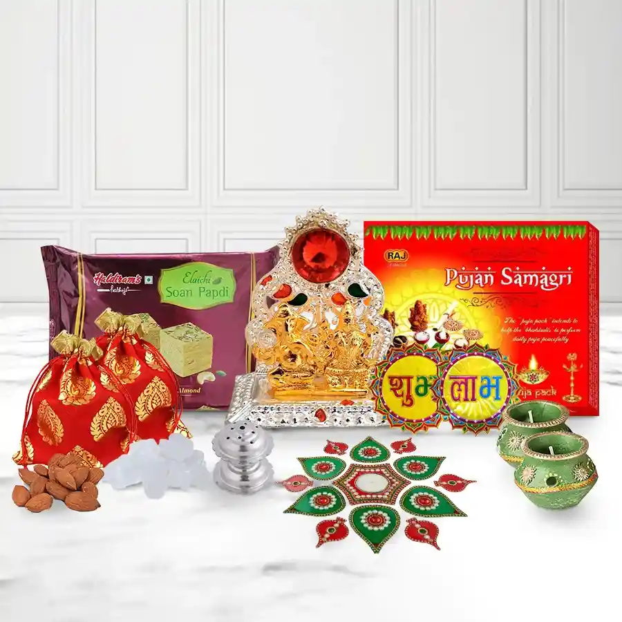 Classy Diwali decorative gift featuring Ganesh Lakshmi Mandap, wax diyas, acrylic rangoli set, puja samagri, Haldiram Soan Papdi, almond mishri, doop box, Subh Labh sticker, and stylish gift box.