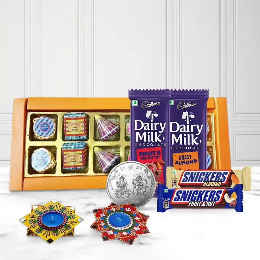 Fabulous Diwali gift hamper featuring handmade chocolates, Dot Mandala Diyas, and a Ganesh Lakshmi coin in an elegant gift box.