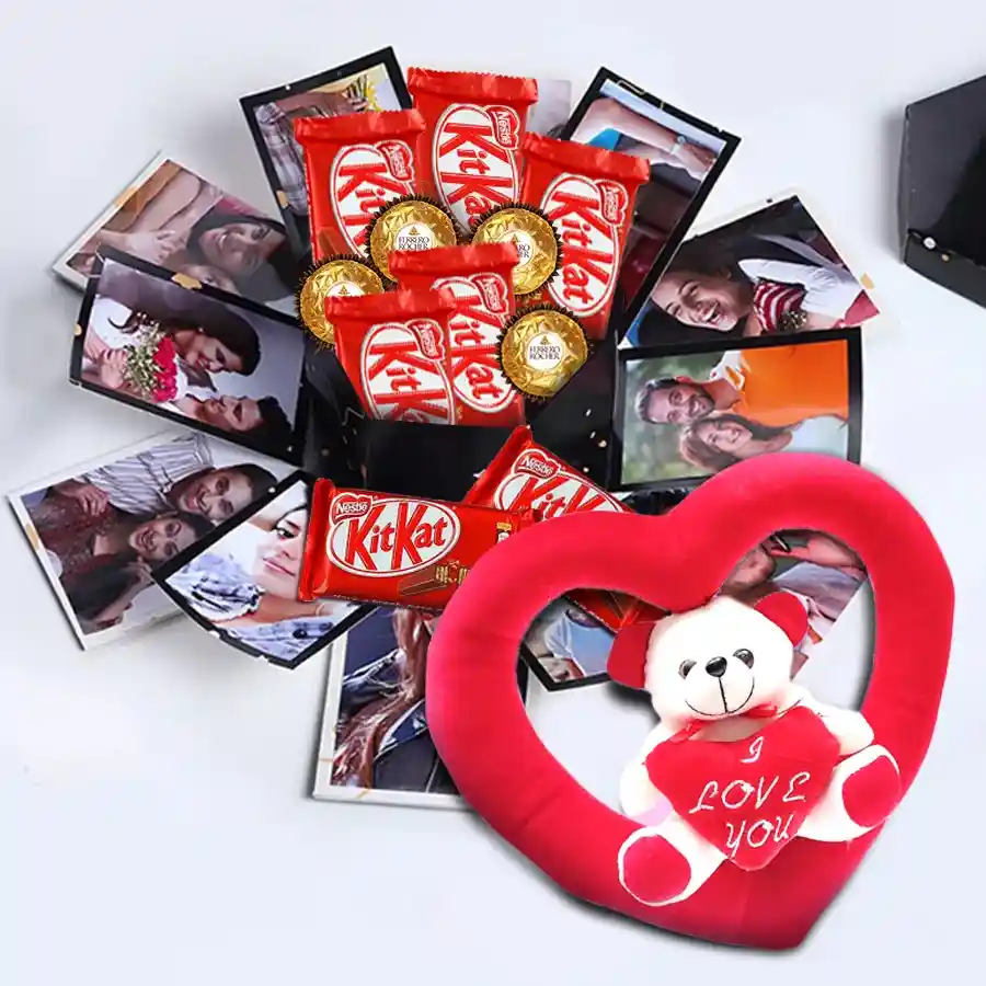 Personalized hexagon explosion box filled with Ferrero Rocher, Kit Kat chocolates, a teddy heart, and custom photos or messages.