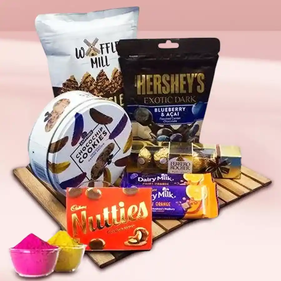 Tasty assorted chocolates hamper with free colorful gulal for Holi celebration