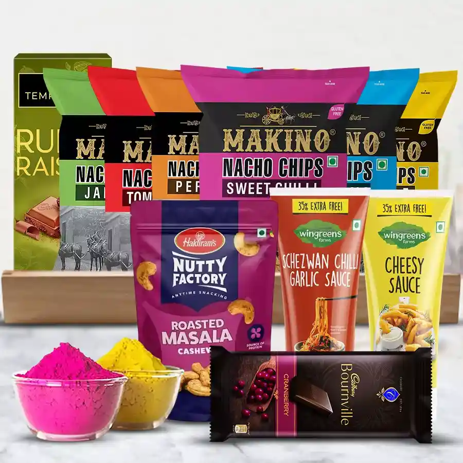 Alluring Gourmet Assortments for Holi including nacho crisps, sauces, chocolates, masala cashews, and herbal gulal in a reusable wooden tray