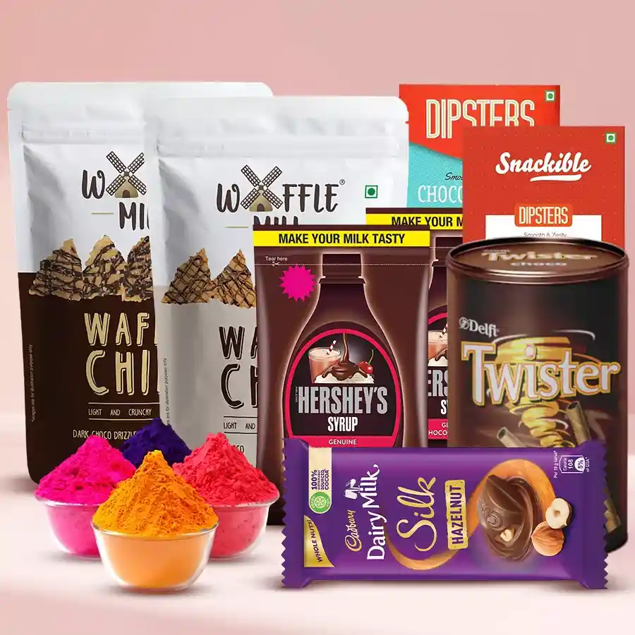 Perfect Chocolate Assortments Hamper for Holi featuring various chocolates and a pack of Herbal Gulal