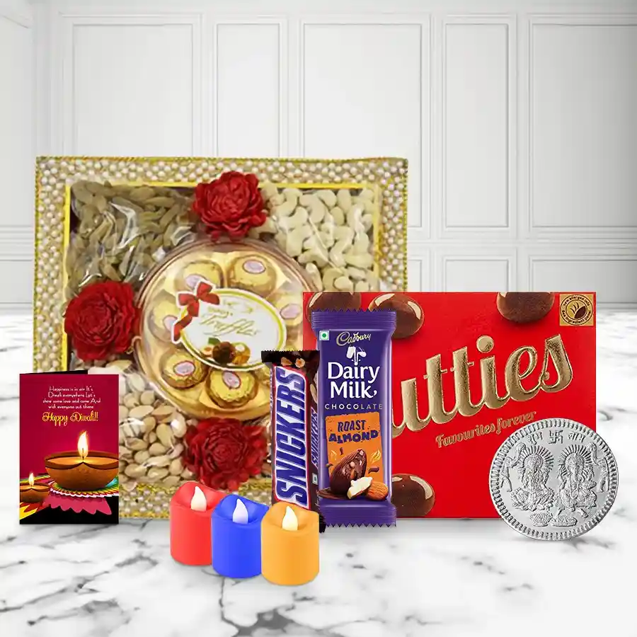 Cheerful Diwali Vibe Gifts Hamper featuring a pearl-decorated tray filled with premium nuts, chocolates, tea light candles, a silver-plated Ganesh Laxmi coin, and a Diwali greetings card.
