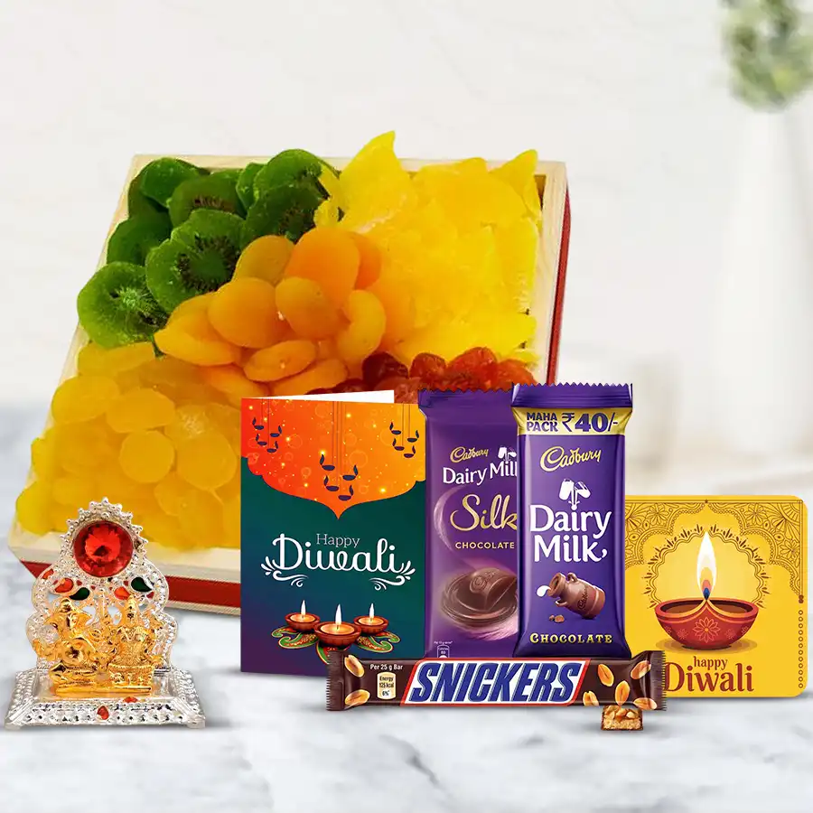 Mindful Indulgence Diwali Gift Hamper with wooden tray, assorted dried fruits, Cadbury Milk and Snickers chocolates, Ganesh Lakshmi Mandap, handmade fridge magnet, and a Diwali greeting card.