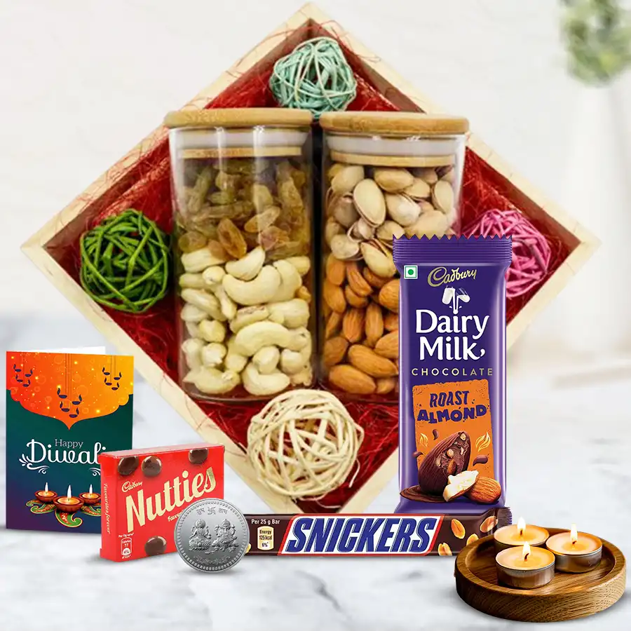 Celebration Time Diwali Treat Hamper with wooden tray, glass jars of nuts, chocolates, tea light candles, and a Ganesh & Laxmi coin