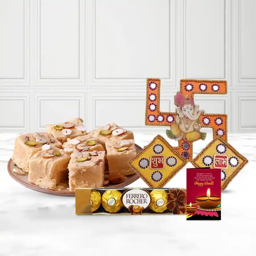 Wholesome Diwali Choco and Assortments Treats hamper with decorative items, Soan Papdi, Ferrero Rocher chocolates, and a Diwali wishing card.