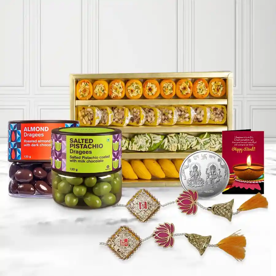 Assorted sweets and dragee basket for Deepavali celebrations with Shubh Labh Torans and Ganesh Laxmi Coin