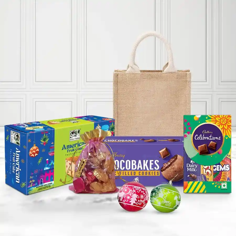 Tasty Chocolate and Christmas Cake Hamper with decorative elements and a reusable jute bag