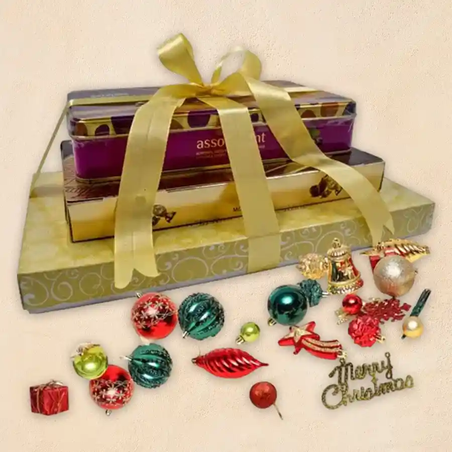 Exciting Christmas Special Chocolate Tower featuring Luxure Truffle Chocolates, Ferrero Rocher Moments, Sapphire Almond Coated Chocolates, and festive decorations