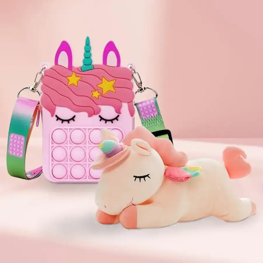 Adorable pink unicorn soft toy next to a vibrant Pop It sling bag on a colorful background