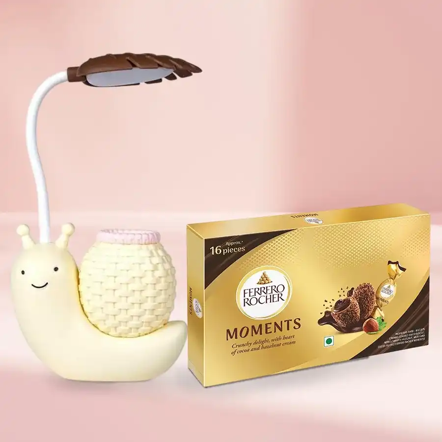 Wonderful combo of Ferrero Rocher chocolates and a snail table lamp cum pen stand