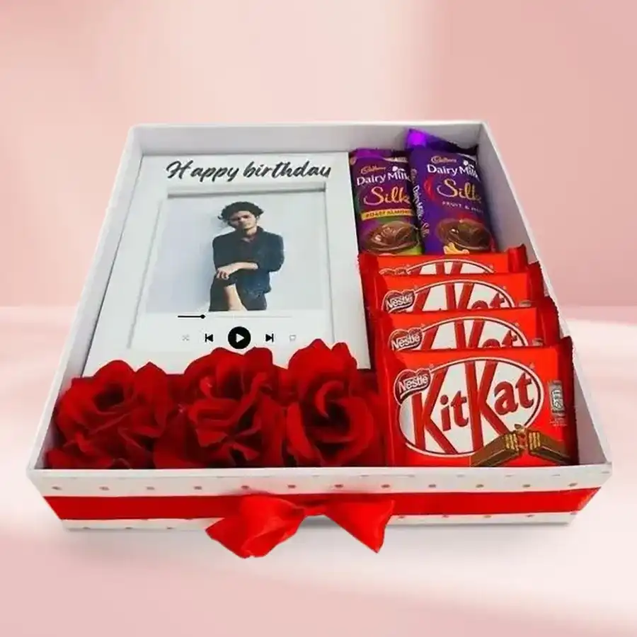 Personalized music photo frame gift hamper with chocolates and red roses