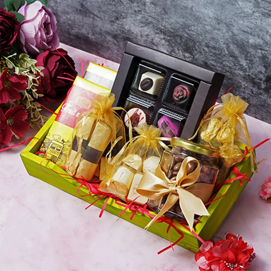 Chocolaty Charm Mini Tray Hamper filled with assorted chocolates, fruit bars, and chocolate-coated treats for Mother's Day