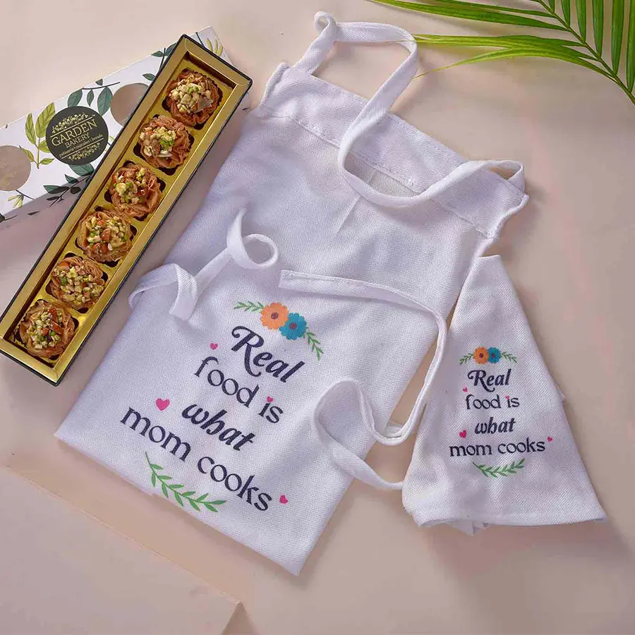 Treating Mom Combo featuring an "Amazing Mom" apron, hand cloth, and a Garden Bakery Tart Baklawa Tray with six pieces.