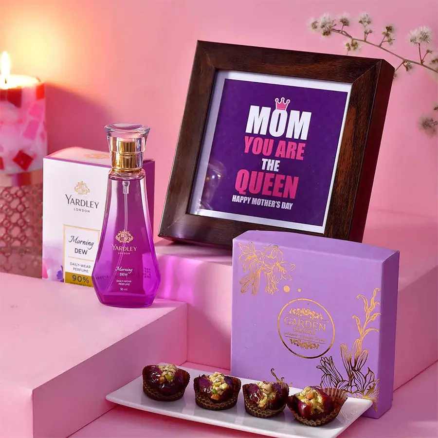 Queen Moms Pamper Hamper featuring a photo frame, Yardley London Morning Dew Perfume, and Garden Bakery Date Baklawa