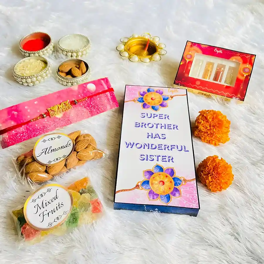Graceful Rakhi with colorful beads and a luxury chocolate bar, complemented by a traditional Rakhi greeting card and roli tikka set.