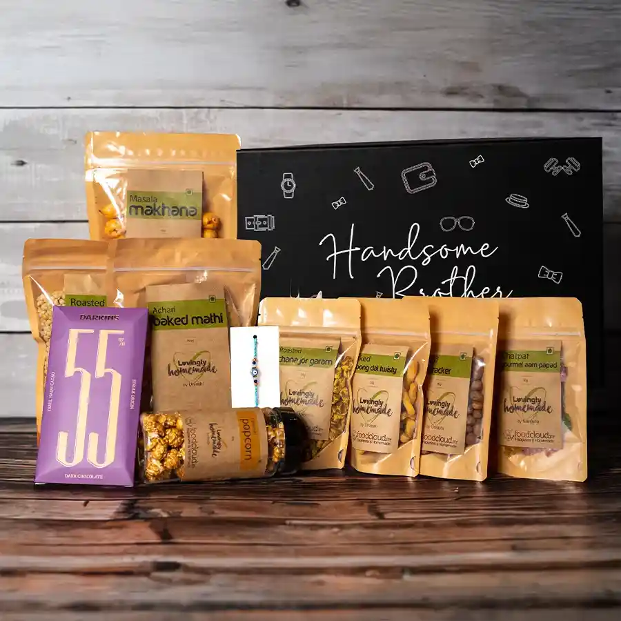 Handsome Bro Perfect Tea Time Snack Gift for Rakhi featuring assorted snacks and a stylish Evil Eye Rakhi