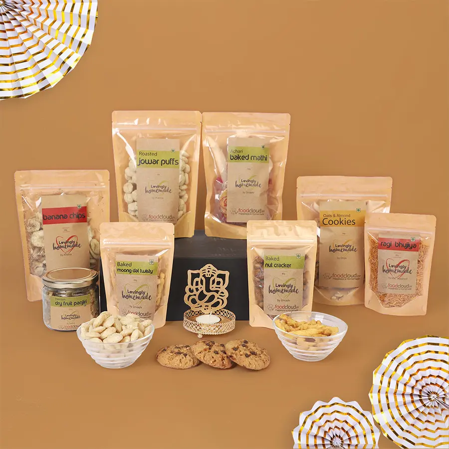 Exquisite Diwali Delights Gift Box with treats and a Lord Ganesha Shadow Tealight Candle Holder