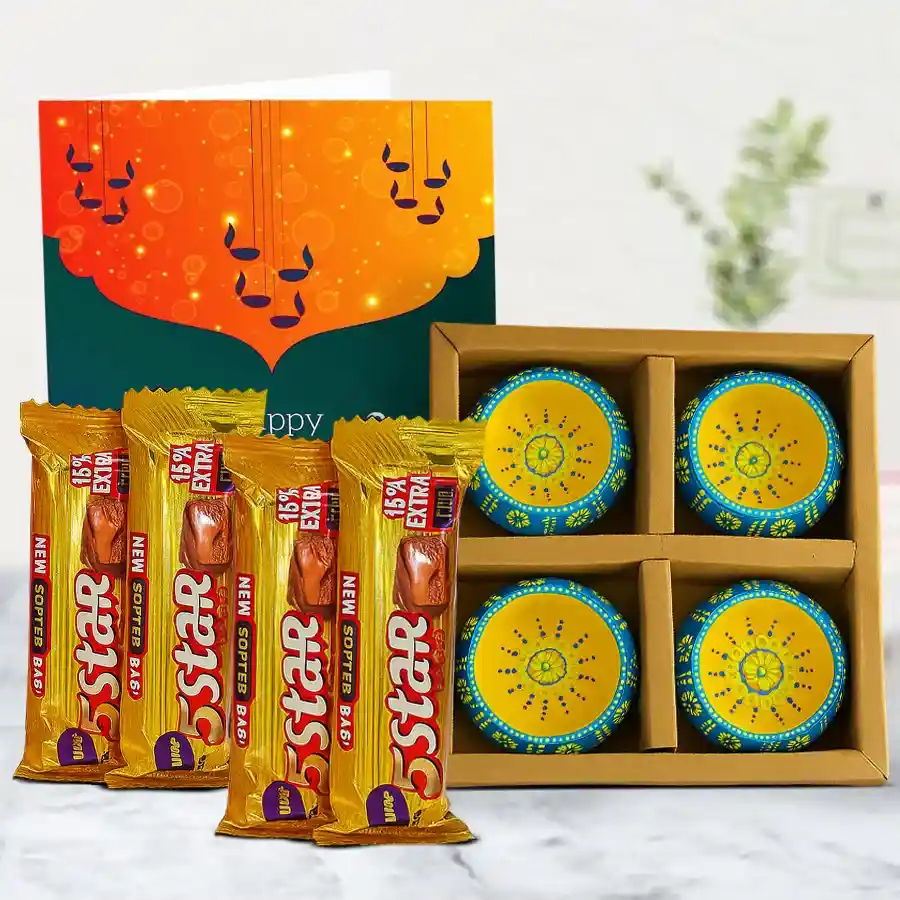 Perfect Diwali Gift Set featuring clay diyas, Cadbury 5 Star chocolates, and a Happy Diwali card