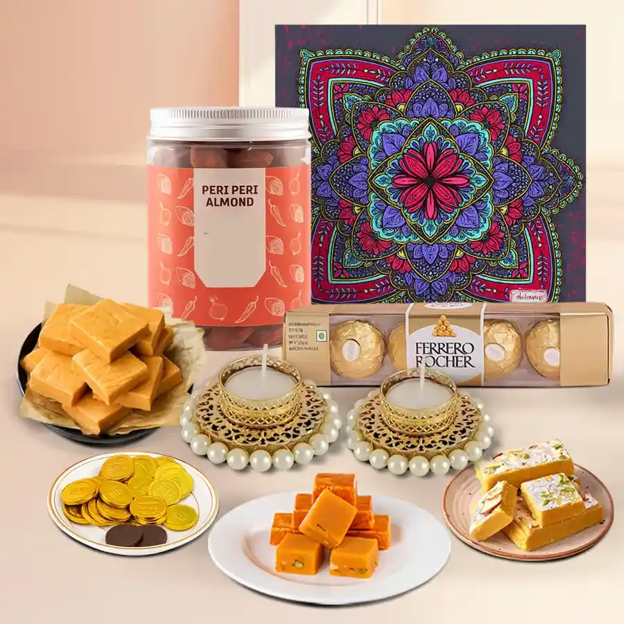 Diwali Sweet Serenity chocolate gift box featuring Almond Peri Peri, assorted Fudge Bites, Ferrero Rocher, gold coin chocolates, Pearl T-Light Candles, and packaged in a reusable Mandala box.
