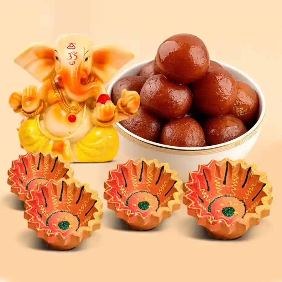 Elegant Diwali Sweet and Gift Hamper including Gulab Jamun, Vignesh Ganesh figurines, and designer clay diyas