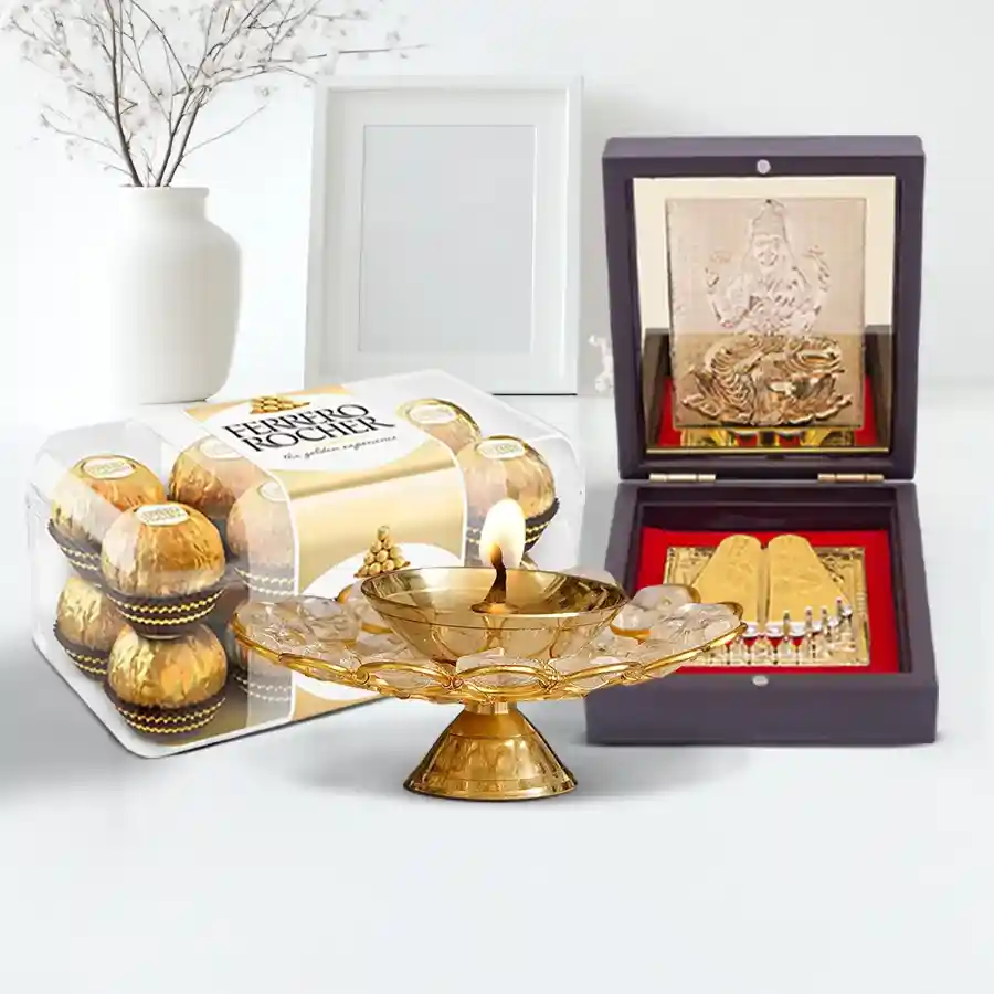 Radiant Diwali Wishes Hamper featuring Ganesh Lakshmi Charan Paduka Prayer Box, Ferrero Rocher chocolates, and a Designer Crystal Diya