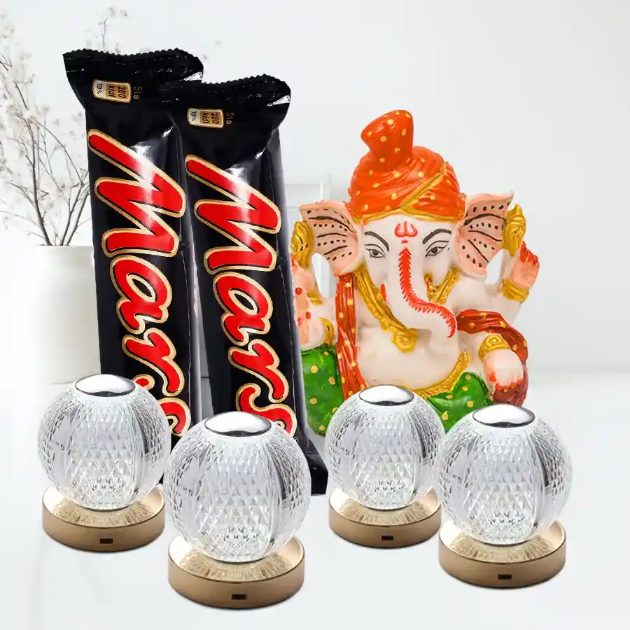 Enchanting Diwali Delights Hamper featuring a Polyresin Pagdi Ganesh idol, two Mars chocolates, and four Crystal LED lights