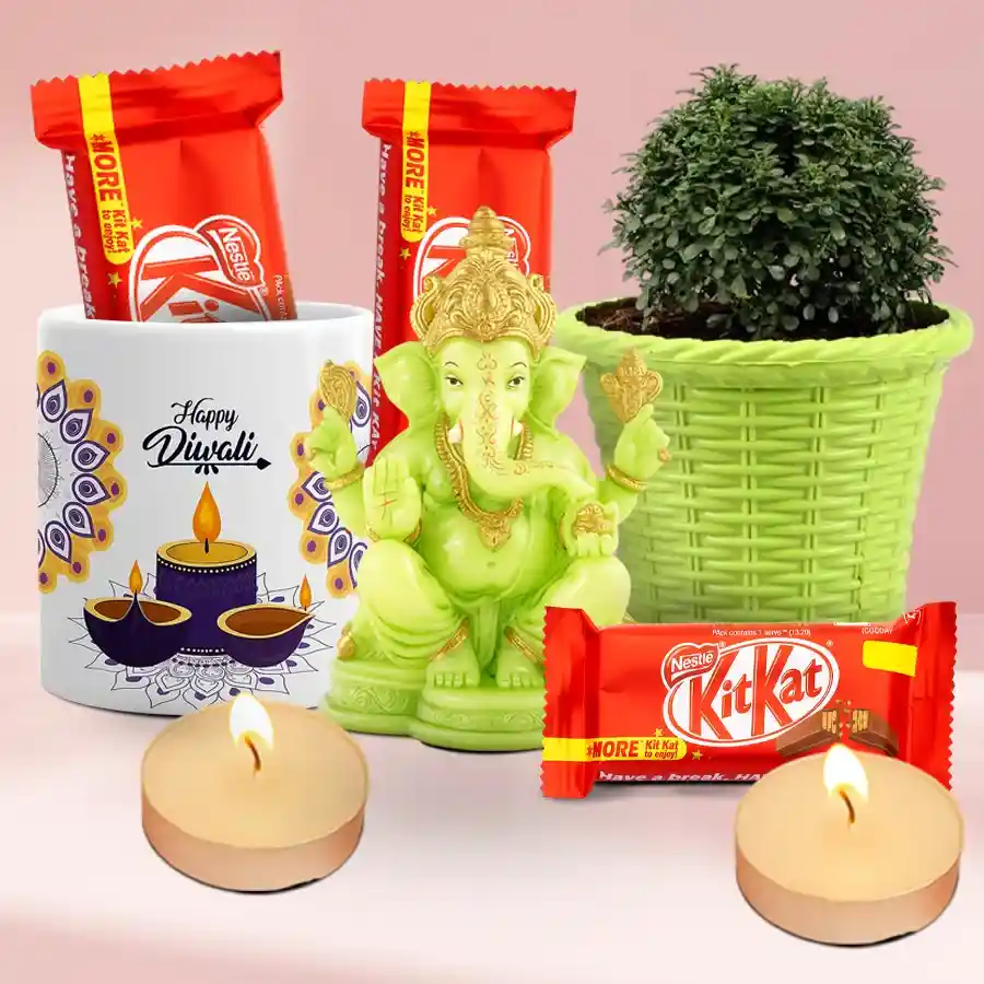 Ultimate Diwali Gift Hamper featuring a Designer Glowing Ganesh Idol, Indoor Kamini Plant, Happy Diwali ceramic mug, Nestle KitKat chocolates, and scented T-light candles.