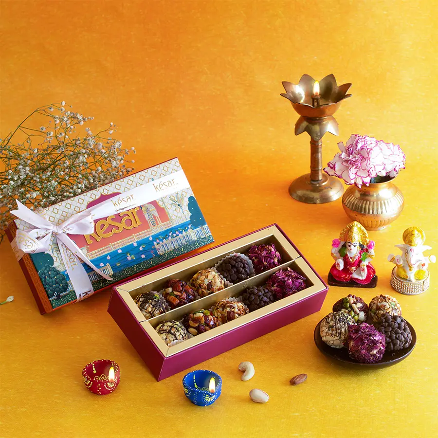 Premium Dryfruit Laddoo and Ganesh Laxmi Idol combo with festive box, diyas, and greeting card