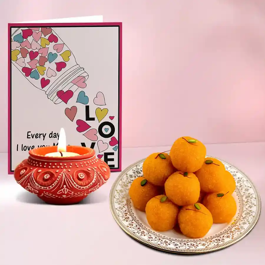 Message of Light Diya with sweets hamper, featuring a decorative Diya, 500g Motichoor Laddu, and a message card, symbolizing Diwali celebrations.