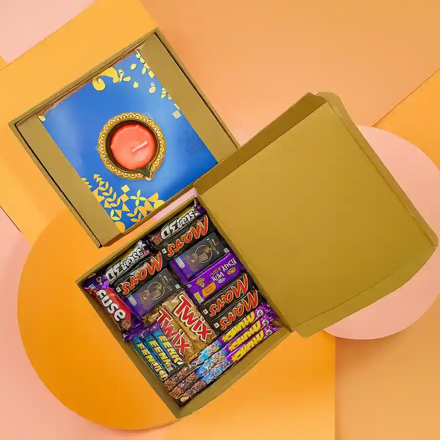 Diwali Sweets Chocs and Diya Gift Hamper with chocolates and a decorative diya