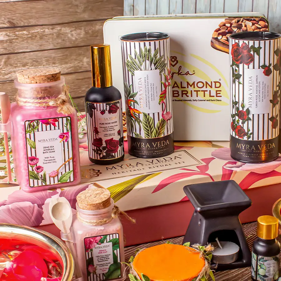 Luxurious Mystical Retreat Hamper featuring bath soak, candle, essential oils, and gourmet snacks arranged beautifully
