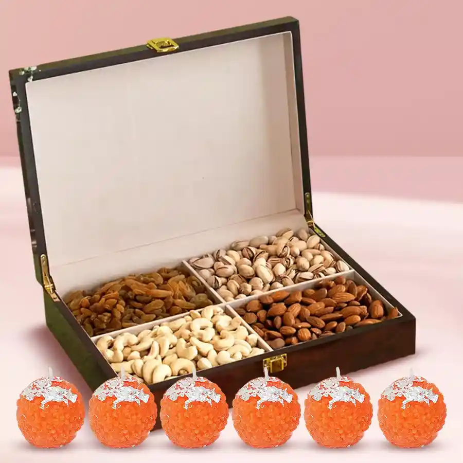 Diwali Treasure Trove gift hamper featuring premium nuts, Ladoo-shaped candles, and stylish designer box