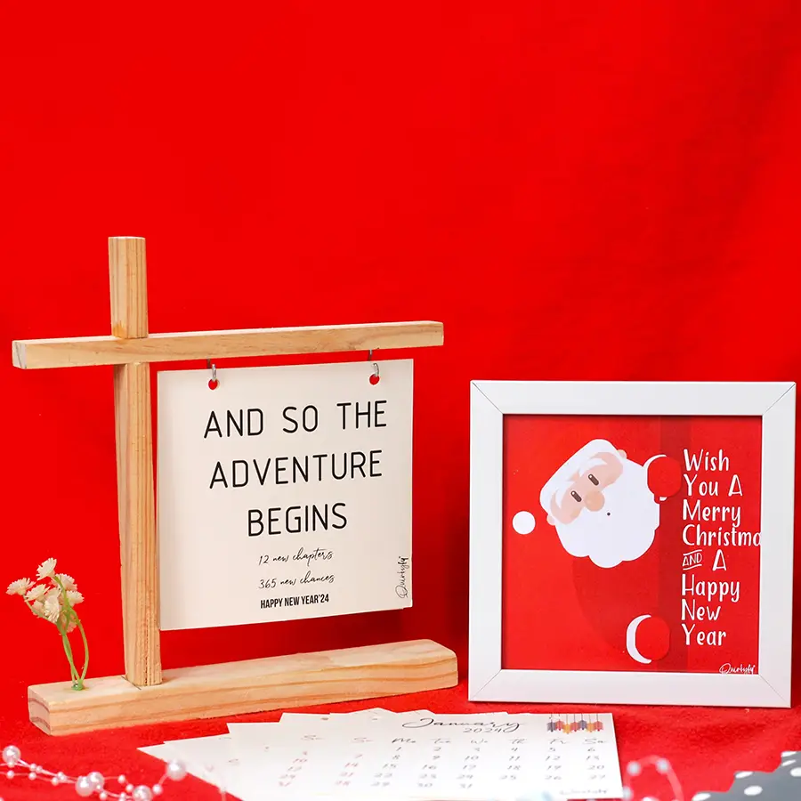 Ultimate Holiday Surprise Gift Set featuring a decorative wall frame and a 2024 pinewood calendar, beautifully arranged with holiday decorations.