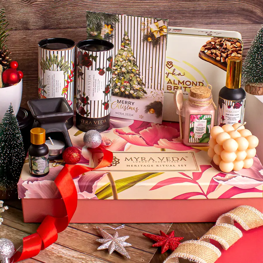A beautifully arranged pamper hamper featuring Almond Brittle Chocolate, Pure Rose Water, an Organic Soya Wax Candle, a diffuser with Bergamot Essential Oil, luxurious lotions, Madagascar Coconut Milk & Mandarin Body Wash, Organic Clay, and a Tea Light Candle.