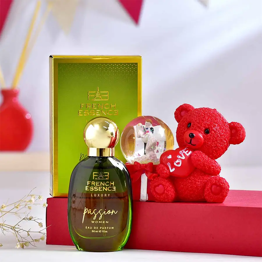 Passionate French Parfum and Raisin Teddy Combo gift set featuring a 30ml fragrance bottle and a 4-inch red raisin teddy holding a heart.