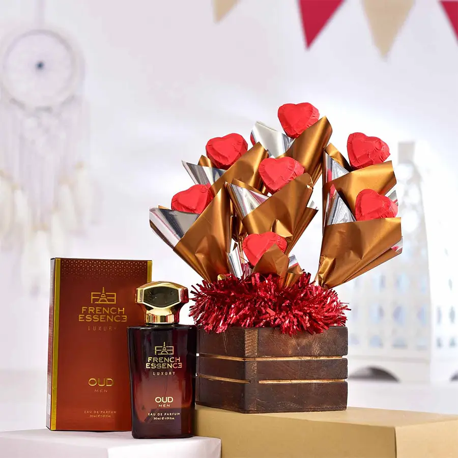 Wholesome Chocolates and Men's Parfum Gift Set in a wooden pot with handcrafted chocolates and a 30ml French Essence OUD parfum