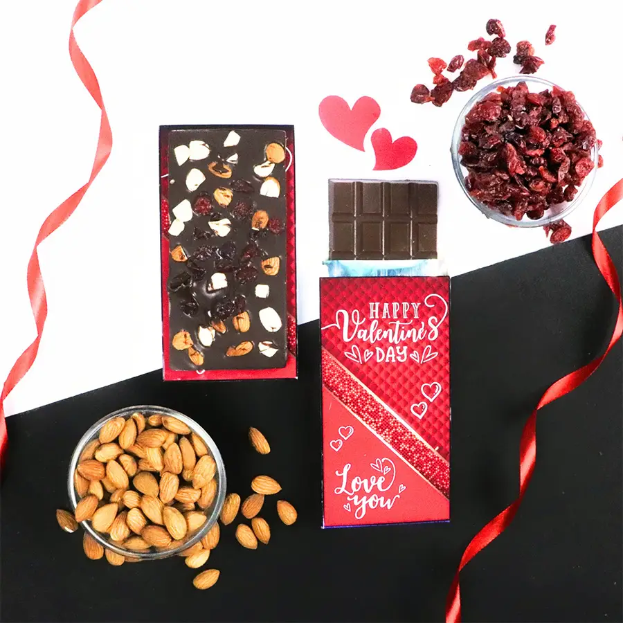 Delightful Assorted Valentines Chocolate Bar wrapped in a Valentine’s-themed box with roasted dry fruits and cranberry fillings