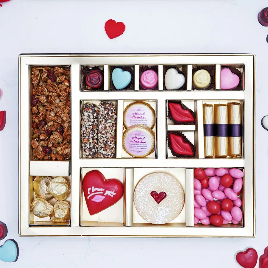 Delish Choco Surprise Gift Box with assorted chocolates, granola, cookies, and heart-shaped treats