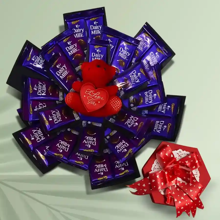 Chocolicious Affair Hexagon Explosion Box with Dairy Milk Chocolates and a teddy bear inside