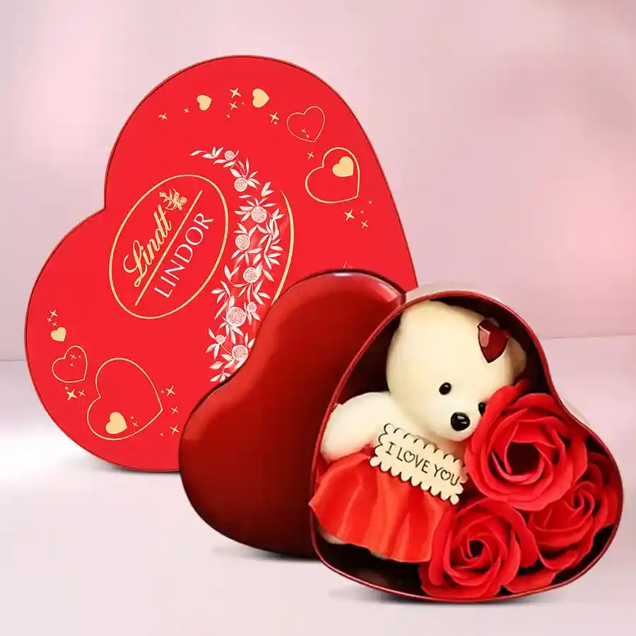 Box of Love Gift Set featuring red roses, a teddy bear, and Lindt Lindor chocolates