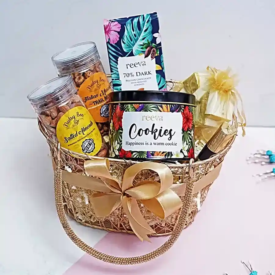 Exquisite Gourmet Treats Gift Set featuring salted almonds, Italian masala trail mix, 70% dark Belgian chocolate with roasted almonds, a cookie tin, assorted chocolates, and a strawberry crisp chocolate log in a luxurious box