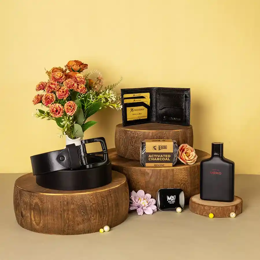 Decadent Men's Grooming and Accessories Gift Box featuring Beardo Activated Charcoal Soap, Zara Men’s Perfume, Impact Mint Tin, Richborn Black Wallet, and Black Leather Buckle Belt.