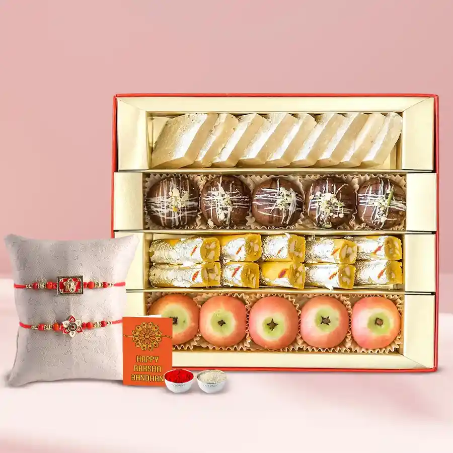 Delectable gift box of Haldirams aperitive sweets for Raksha Bandhan including a Rakhi, Roli Tilak, and Chawal